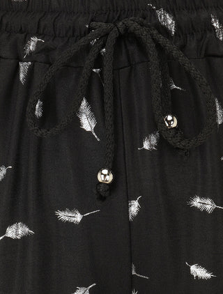 Pantalon élastiqué imprimé plumes irisées - Noir